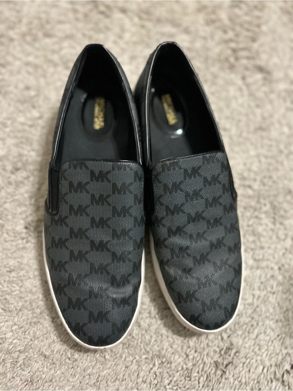 Michael Kors Black MK Monogram Slip-On Sneakers with White Soles